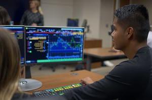 A student at a Bloomberg Terminal